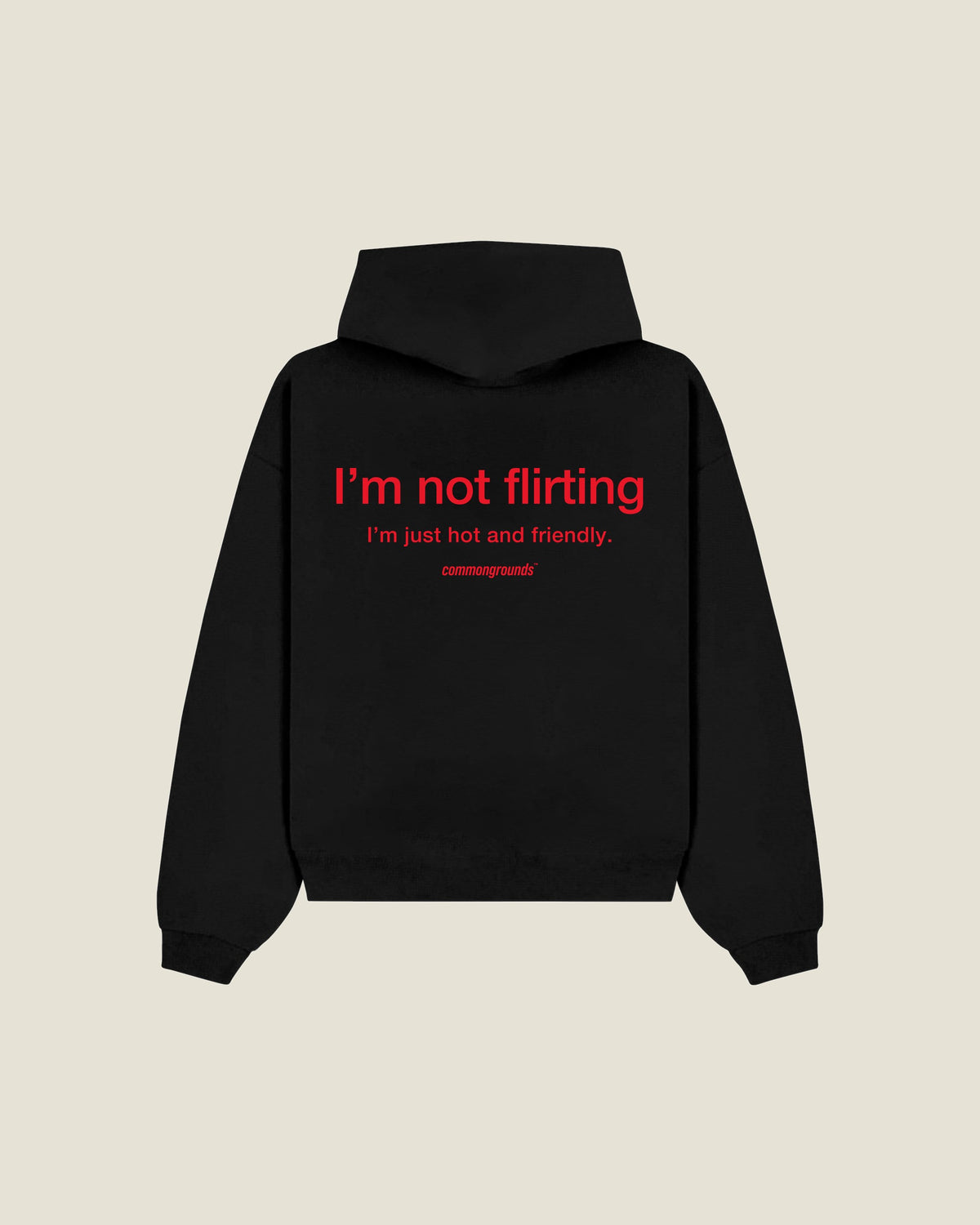 I'M NOT FLIRTING I'M JUST HOT AND FRIENDLY Hoodie in black, back print