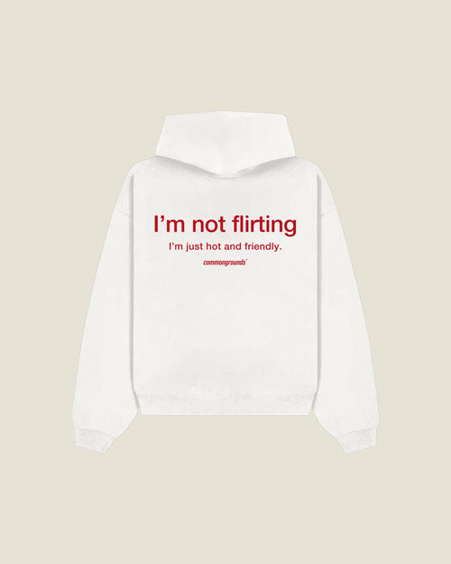 I'M NOT FLIRTING I'M JUST HOT AND FRIENDLY Hoodie in white, back print