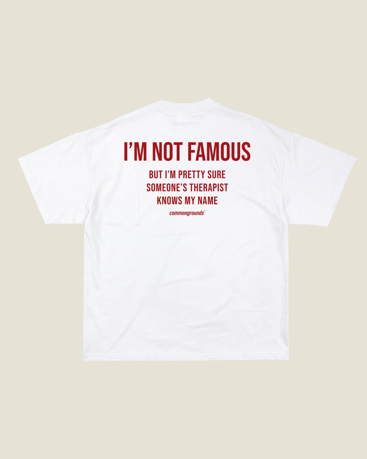 I'M NOT FAMOUS BUT I'M PRETTY SURE SOMEONE'S THERAPIST KNOWS MY NAME Tee in white, back print
