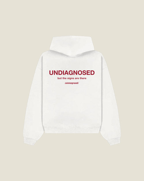 Undiagnosed But The Signs Are There Hoodie in white, back print