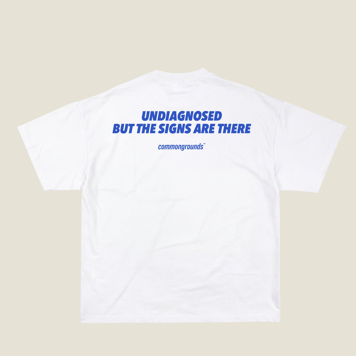 UNDIAGNOSED BUT THE SIGNS ARE THERE Tee in white, back print