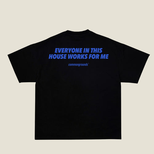 EVERYONE IN THIS HOUSE WORKS FOR ME Tee in black, back print