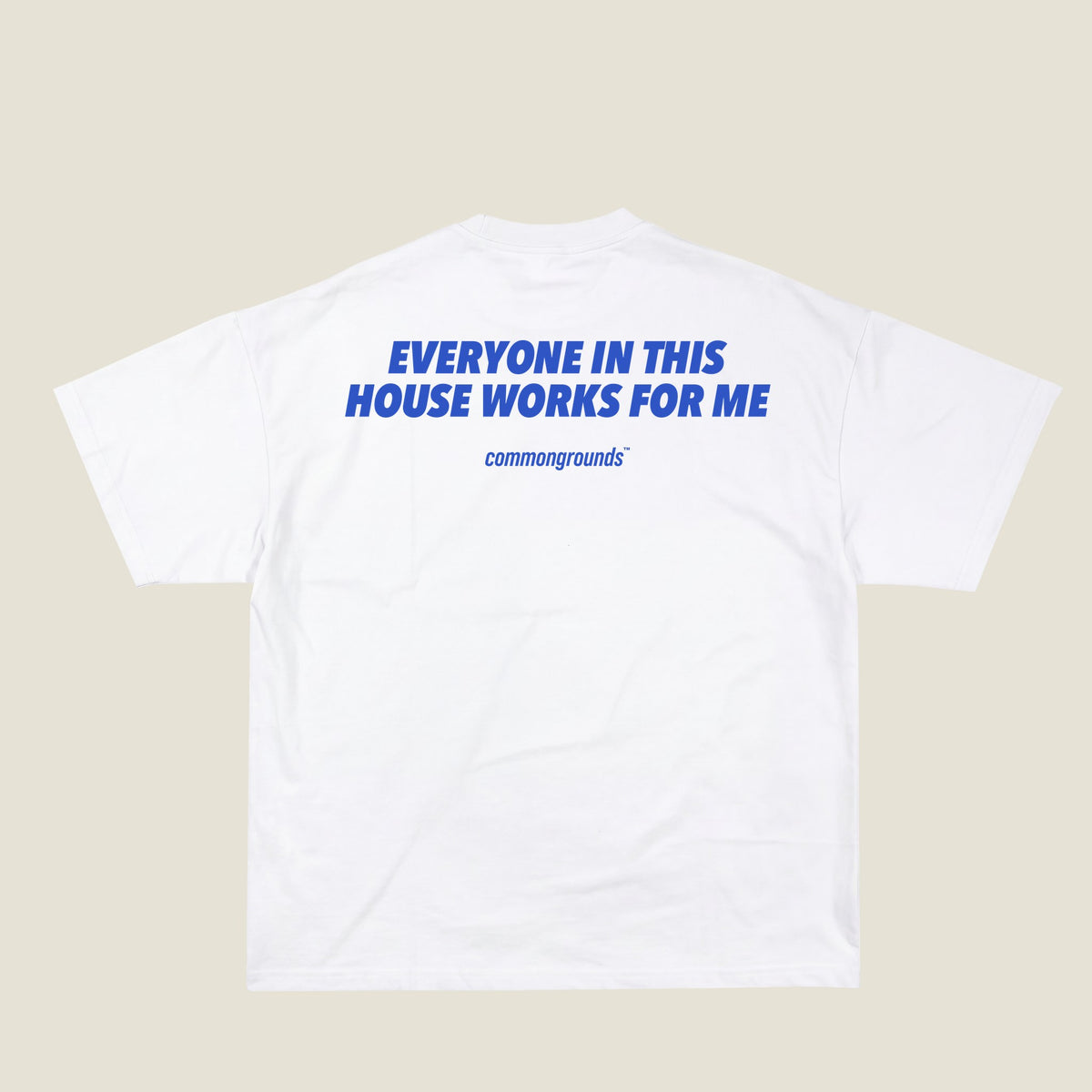 EVERYONE IN THIS HOUSE WORKS FOR ME Tee in white, back print