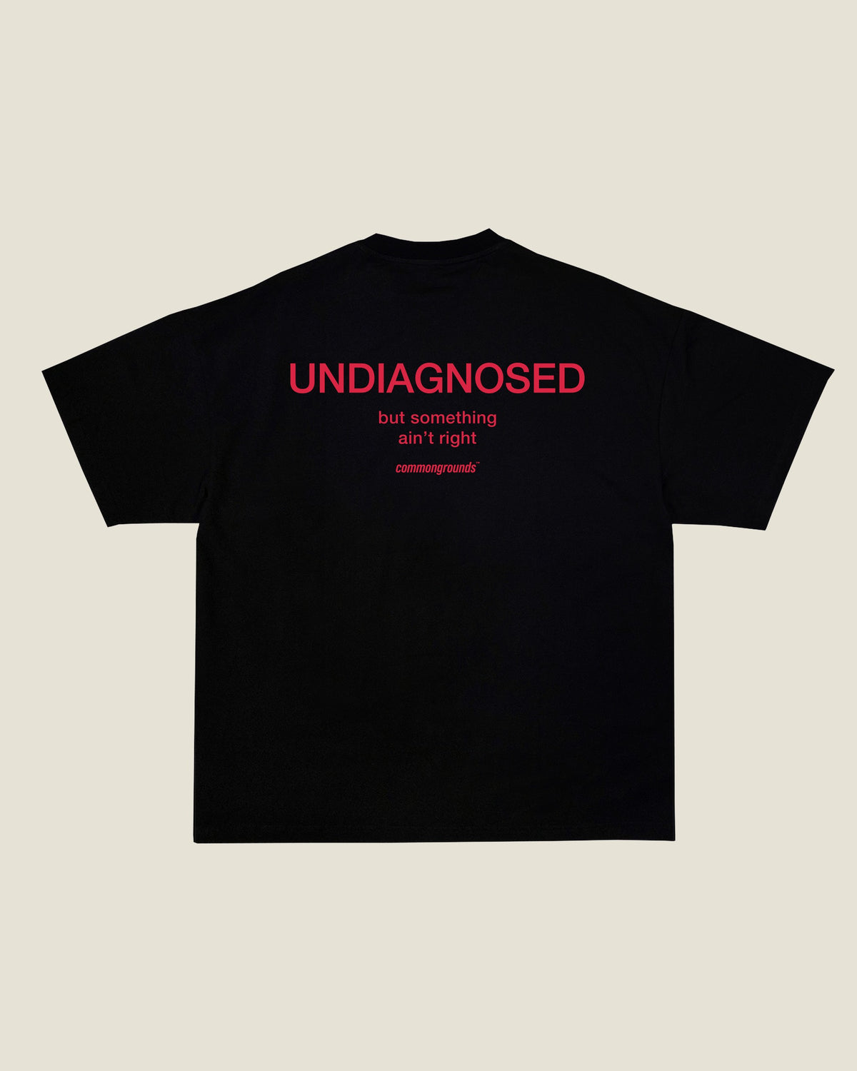 UNDIAGNOSED BUT SOMETHING AIN'T RIGHT Tee in black, back print