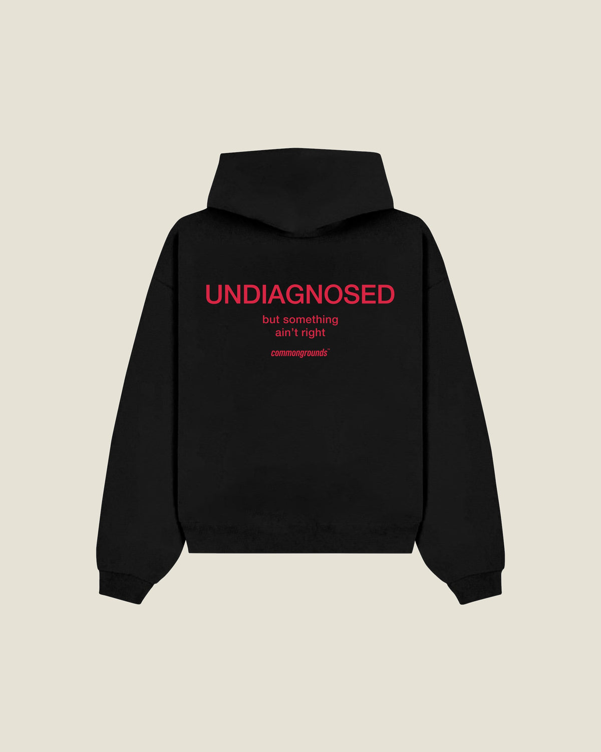 UNDIAGNOSED BUT SOMETHING AIN'T RIGHT Hoodie in black, back print