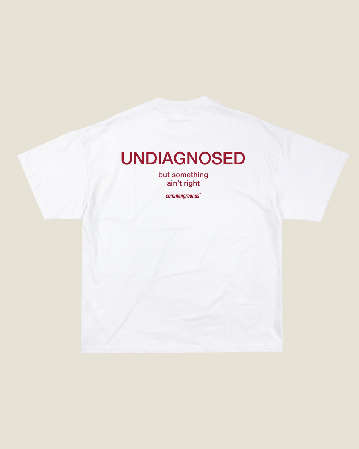 UNDIAGNOSED BUT SOMETHING AIN'T RIGHT Tee in white, back print