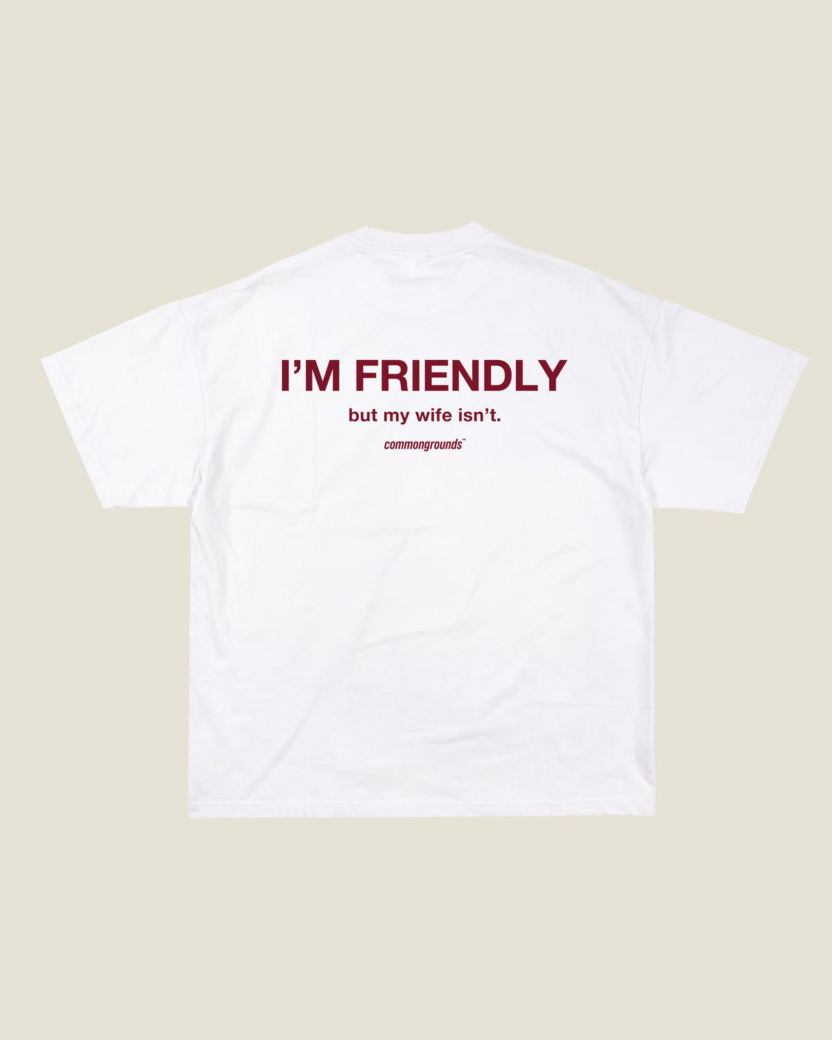 I'M FRIENDLY, BUT MY WIFE ISN'T Tee in white, back print