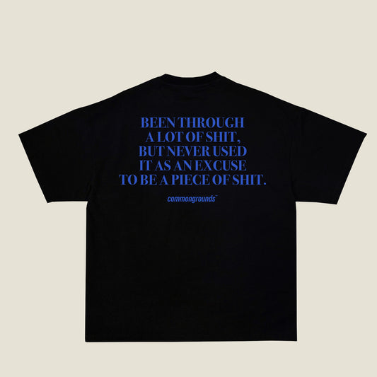 BEEN THROUGH A LOT OF SHIT, BUT NEVER USED IT AS AN EXCUSE TO BE A PIECE OF SHIT Tee in black, back print