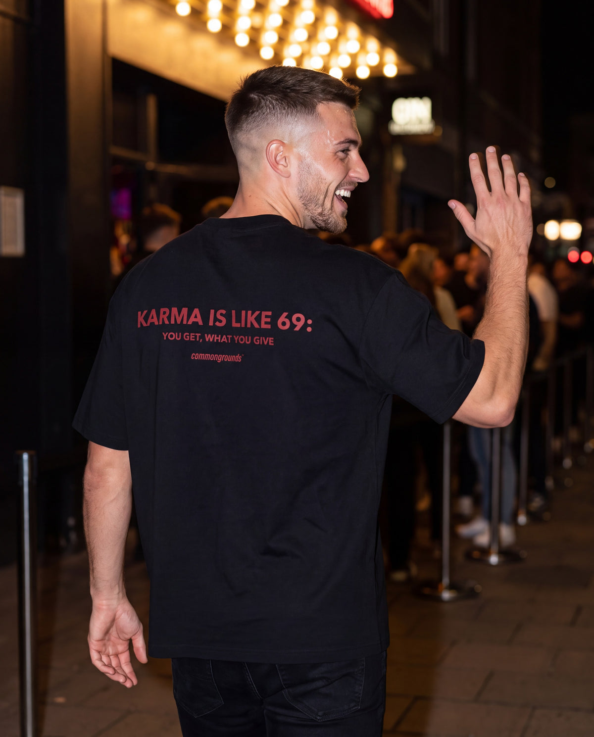 KARMA IS LIKE 69: YOU GET, WHAT YOU GIVE Tee in black, worn