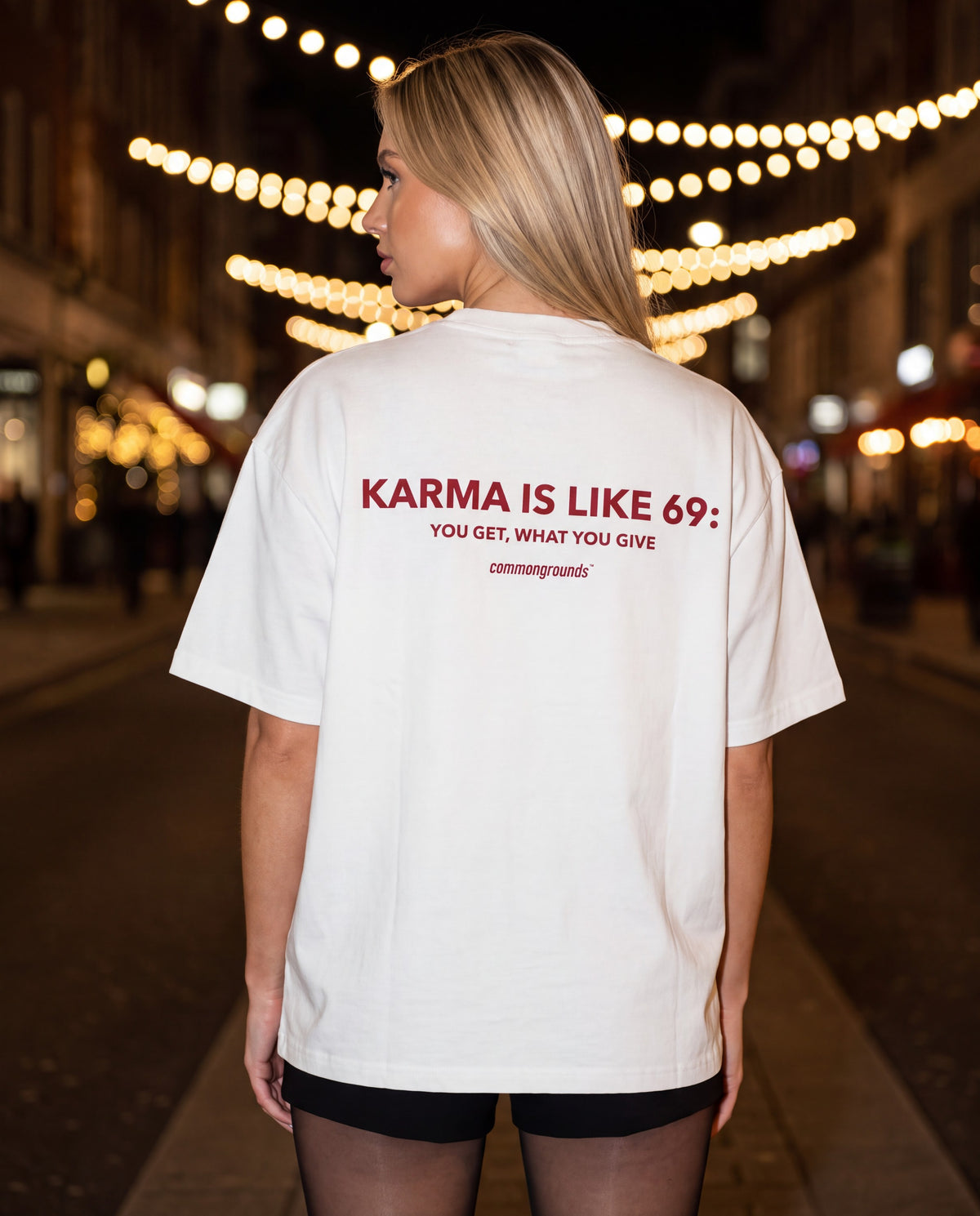 KARMA IS LIKE 69: YOU GET, WHAT YOU GIVE Tee in white, worn