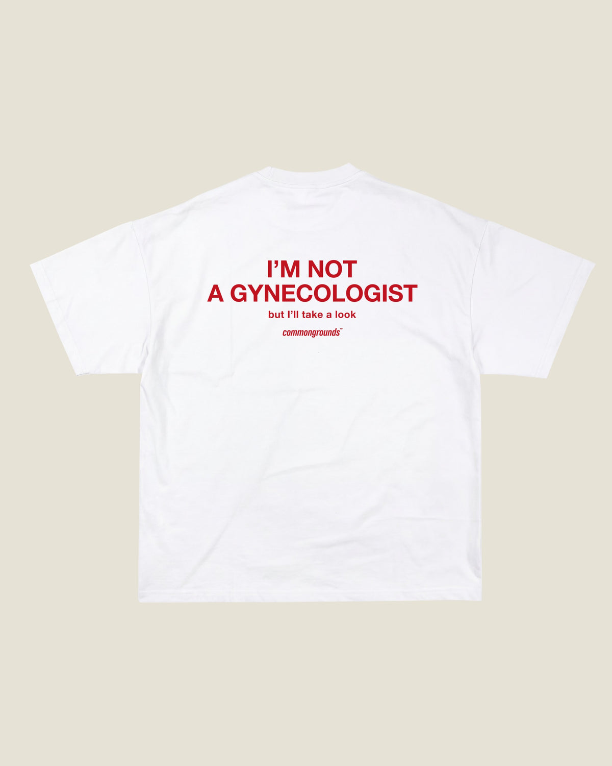I'm Not A Gynecologist But I'll Take A Look Tee in white, back print