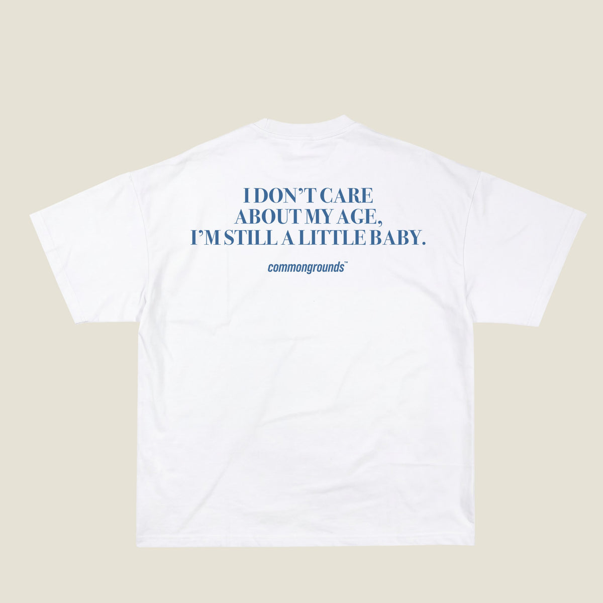 I DON'T CARE ABOUT MY AGE, I'M STILL A LITTLE BABY Tee in white, back print