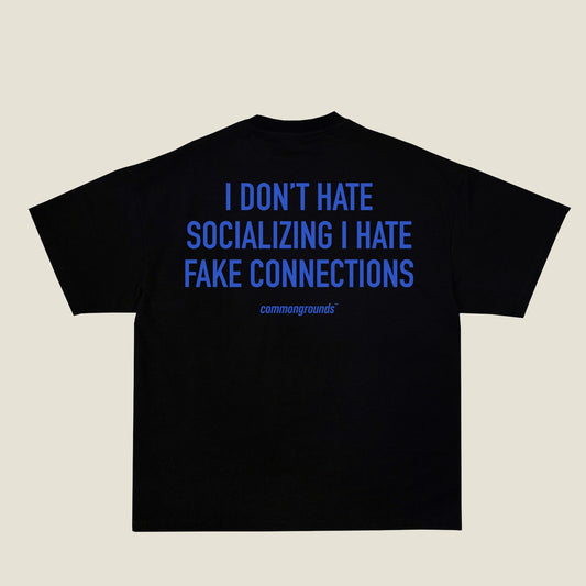 I DON'T HATE SOCIALIZING I HATE FAKE CONNECTIONS Tee in black, back print