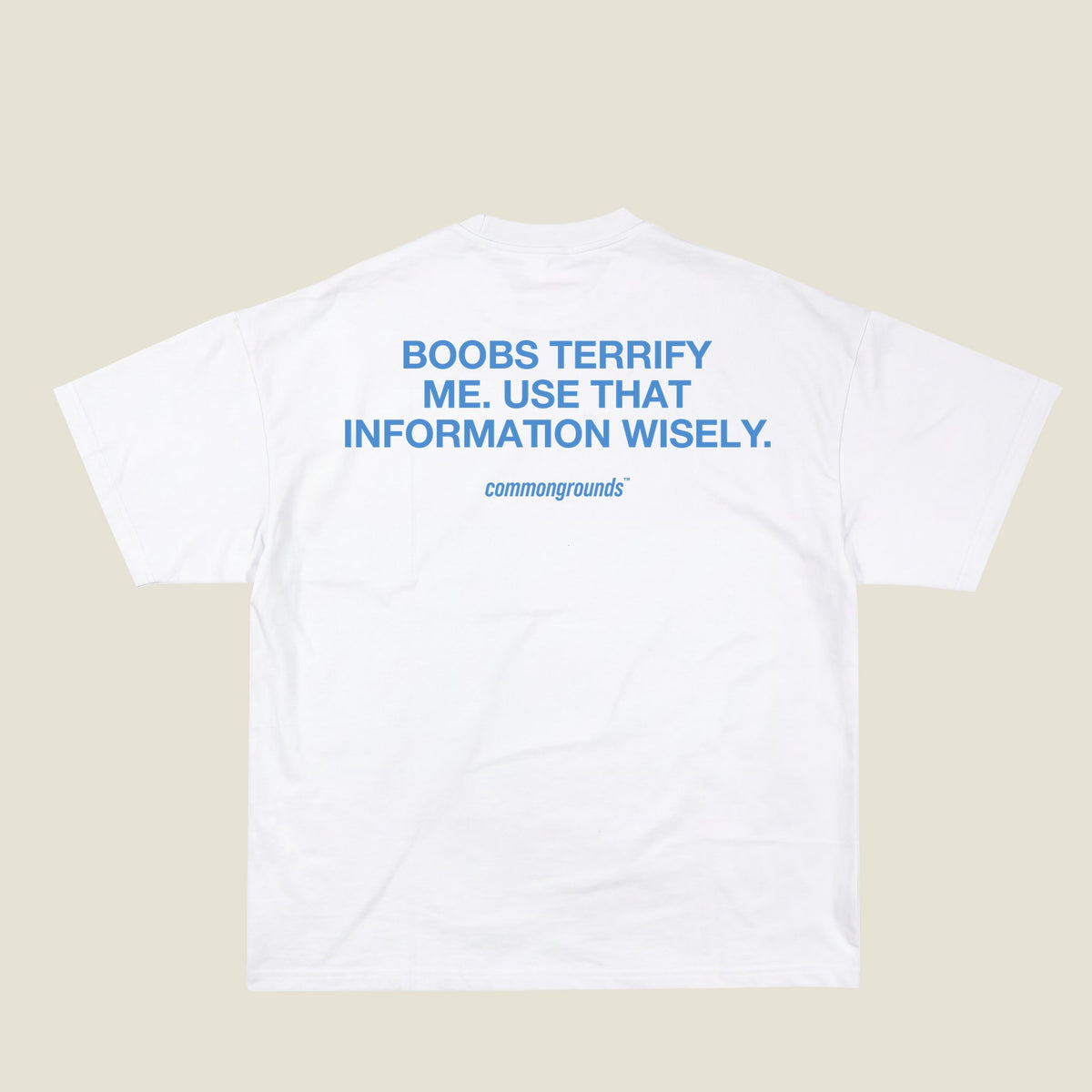 BOOBS TERRIFY ME. USE THAT INFORMATION WISELY Tee in white, back print