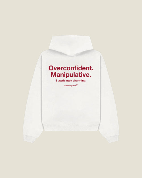 Overconfident. Manipulative. Surprisingly Charming Hoodie in white, back print