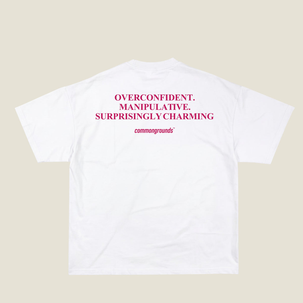 OVERCONFIDENT. MANIPULATIVE. SURPRISINGLY CHARMING Tee in white, back print