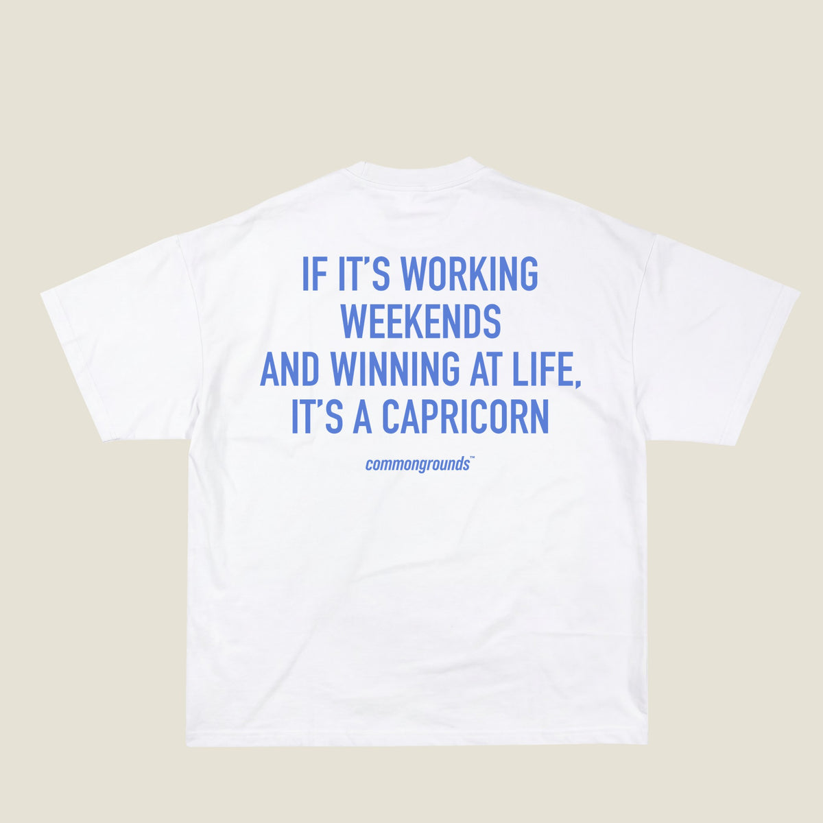 IF IT'S WORKING WEEKENDS AND WINNING AT LIFE, IT'S A CAPRICORN Tee in white, back print