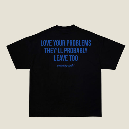 LOVE YOUR PROBLEMS THEY'LL PROBABLY LEAVE TOO Tee in black, back print