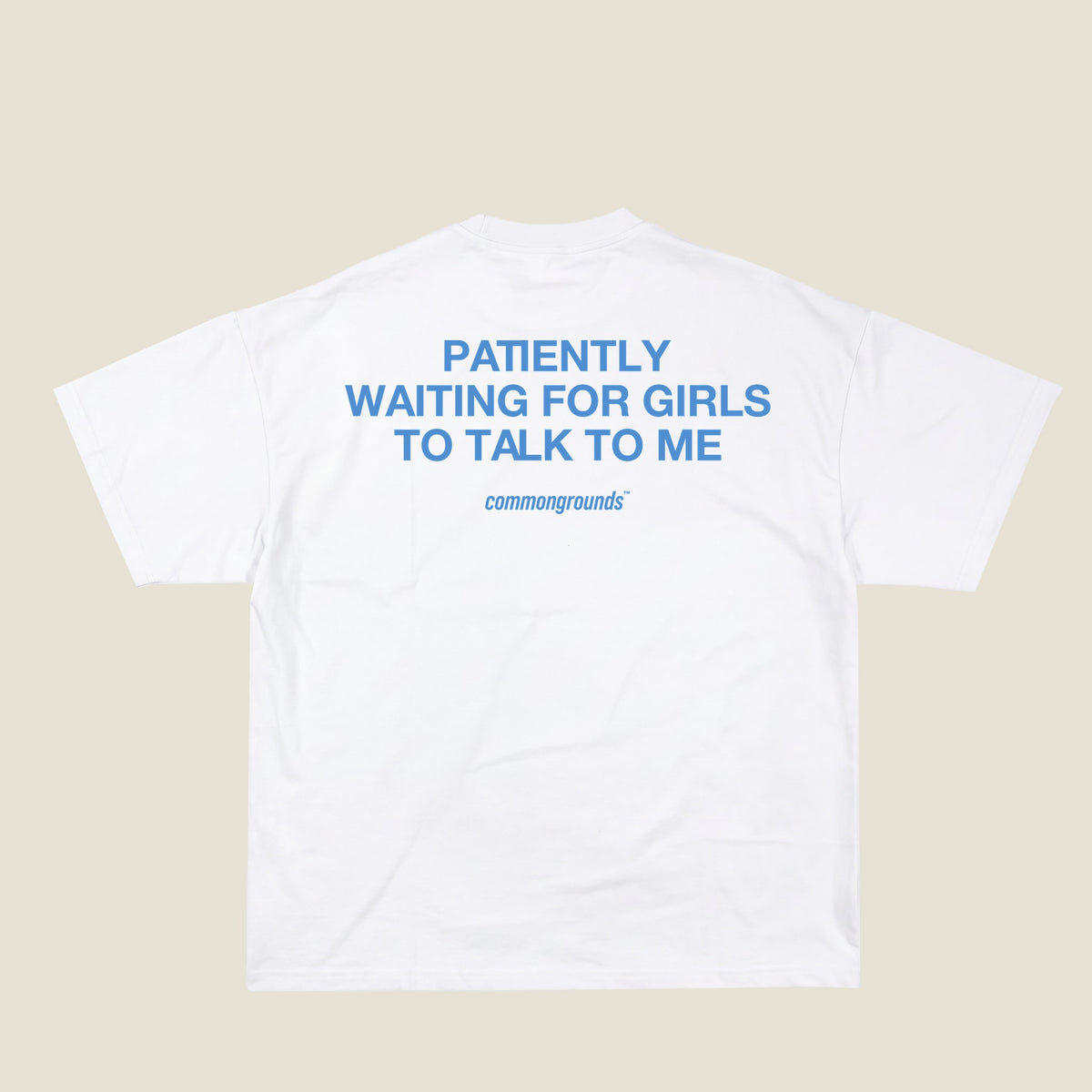 PATIENTLY WAITING FOR GIRLS TO TALK TO ME Tee in white, back print