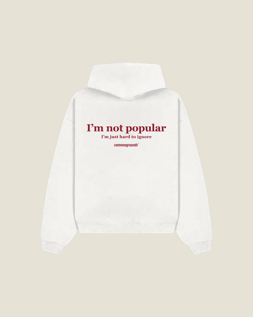 I'm Not Popular I'm Just Hard To Ignore Hoodie in white, back print