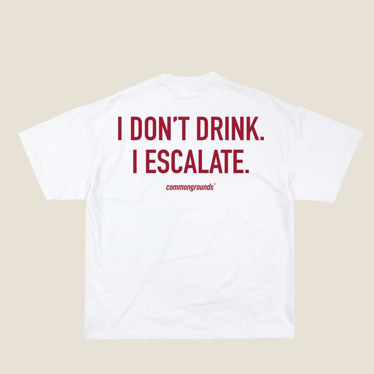 I DON'T DRINK. I ESCALATE Tee in white, back print