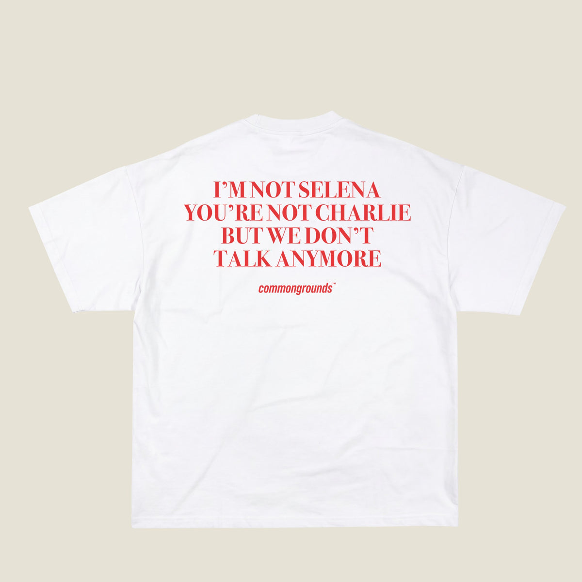I'M NOT SELENA YOU'RE NOT CHARLIE BUT WE DON'T TALK ANYMORE Tee in white, back print