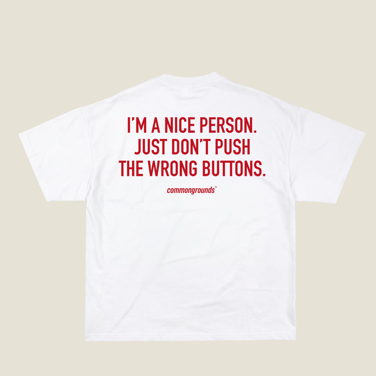 I'M A NICE PERSON. JUST DON'T PUSH THE WRONG BUTTONS Tee in white, back print