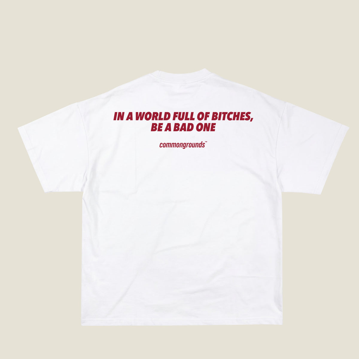IN A WORLD FULL OF BITCHES, BE A BAD ONE Tee in white, back print