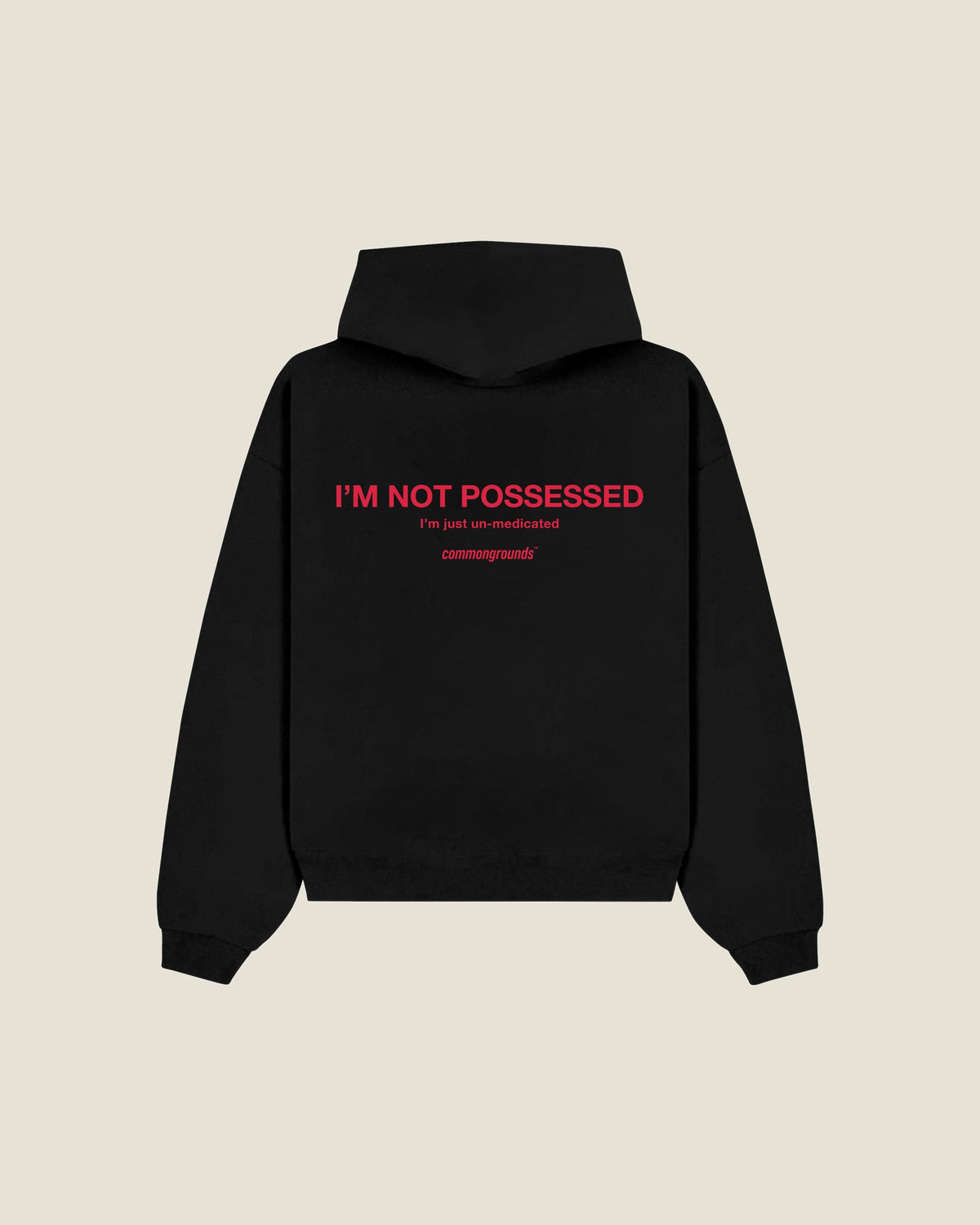 I'm Not Possessed I'm Just Un-medicated Hoodie in black, back print