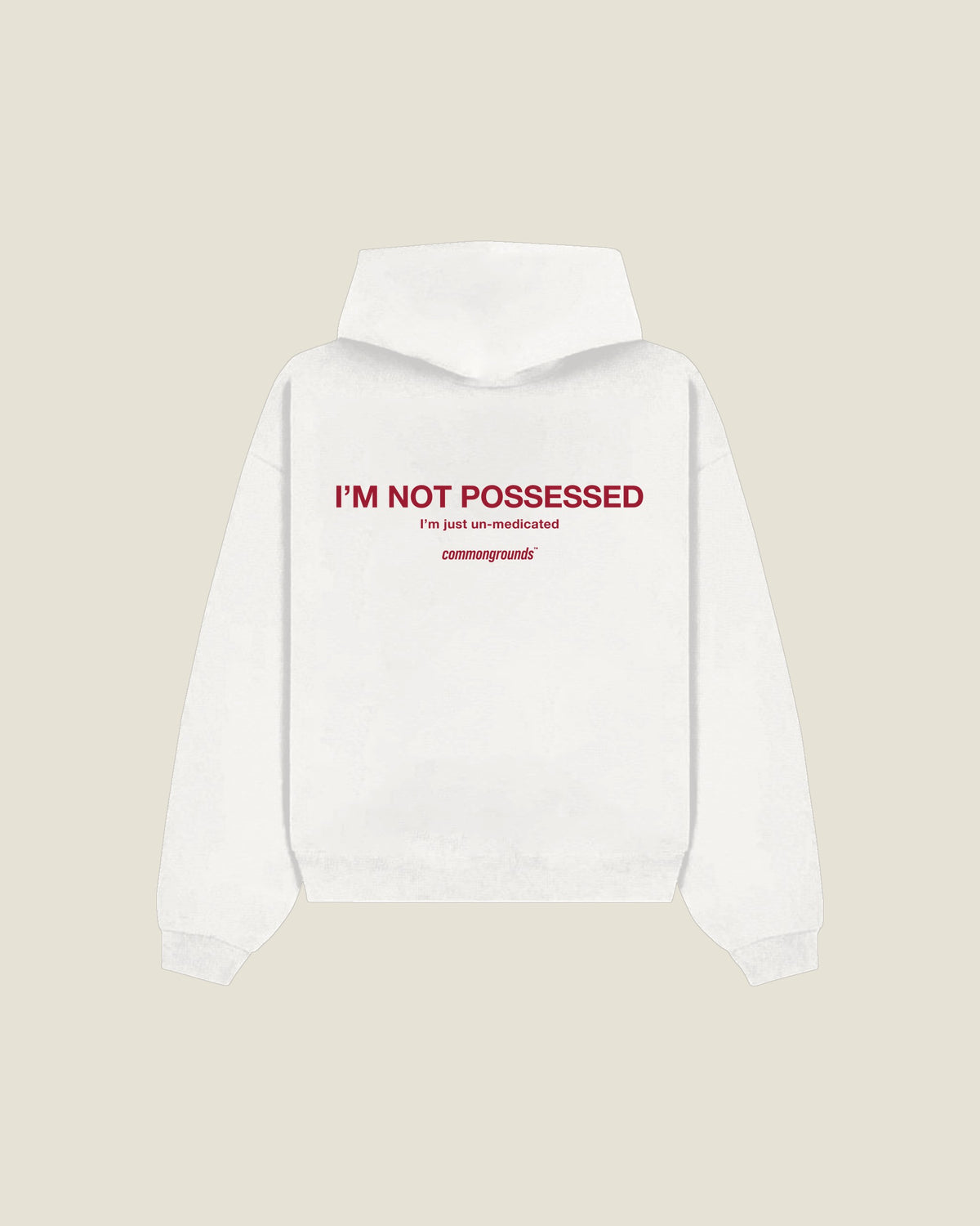 I'm Not Possessed I'm Just Un-medicated Hoodie in white, back print