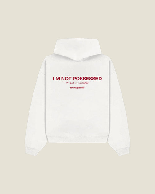 I'm Not Possessed I'm Just Un-medicated Hoodie in white, back print