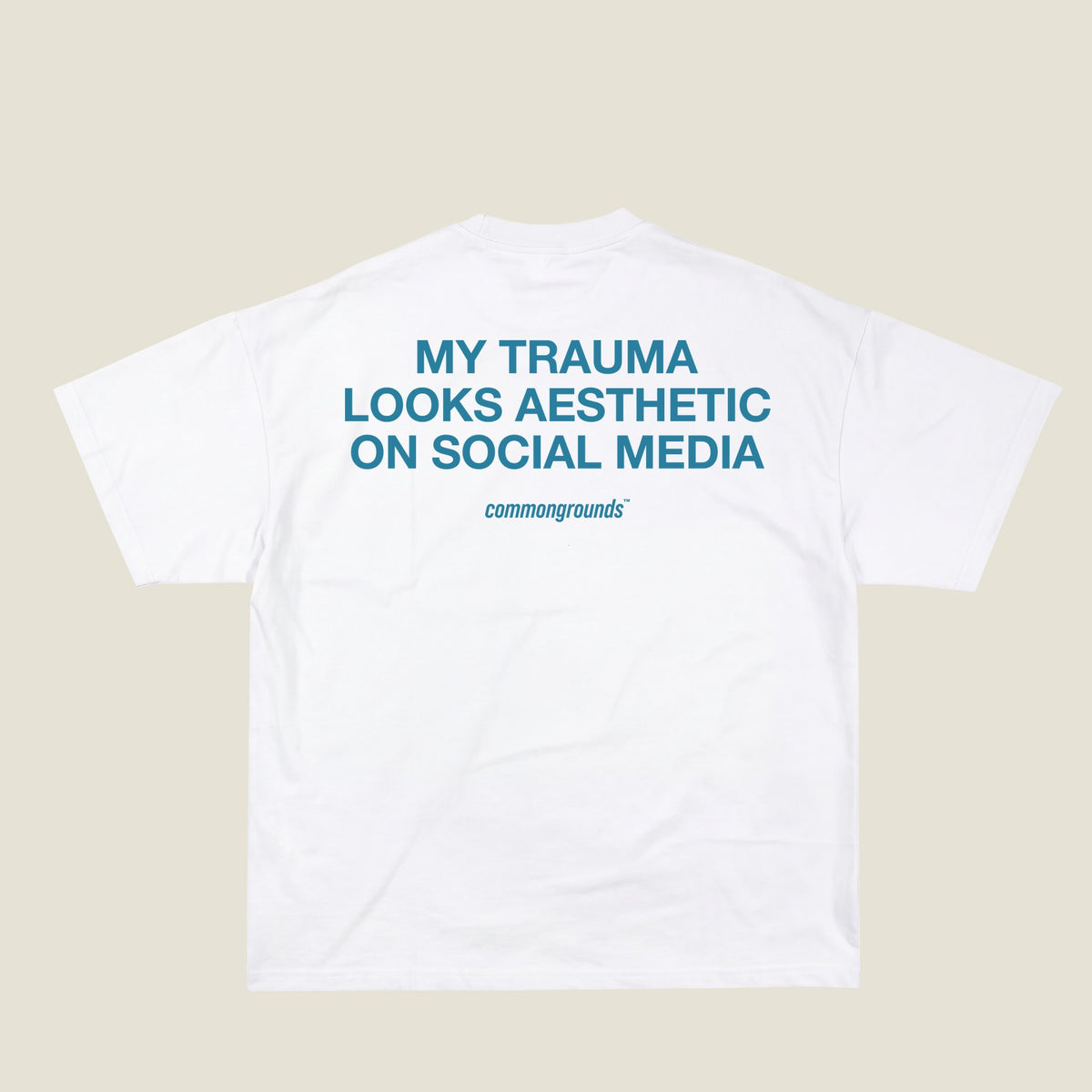 MY TRAUMA LOOKS AESTHETIC ON SOCIAL MEDIA Tee in white, back print
