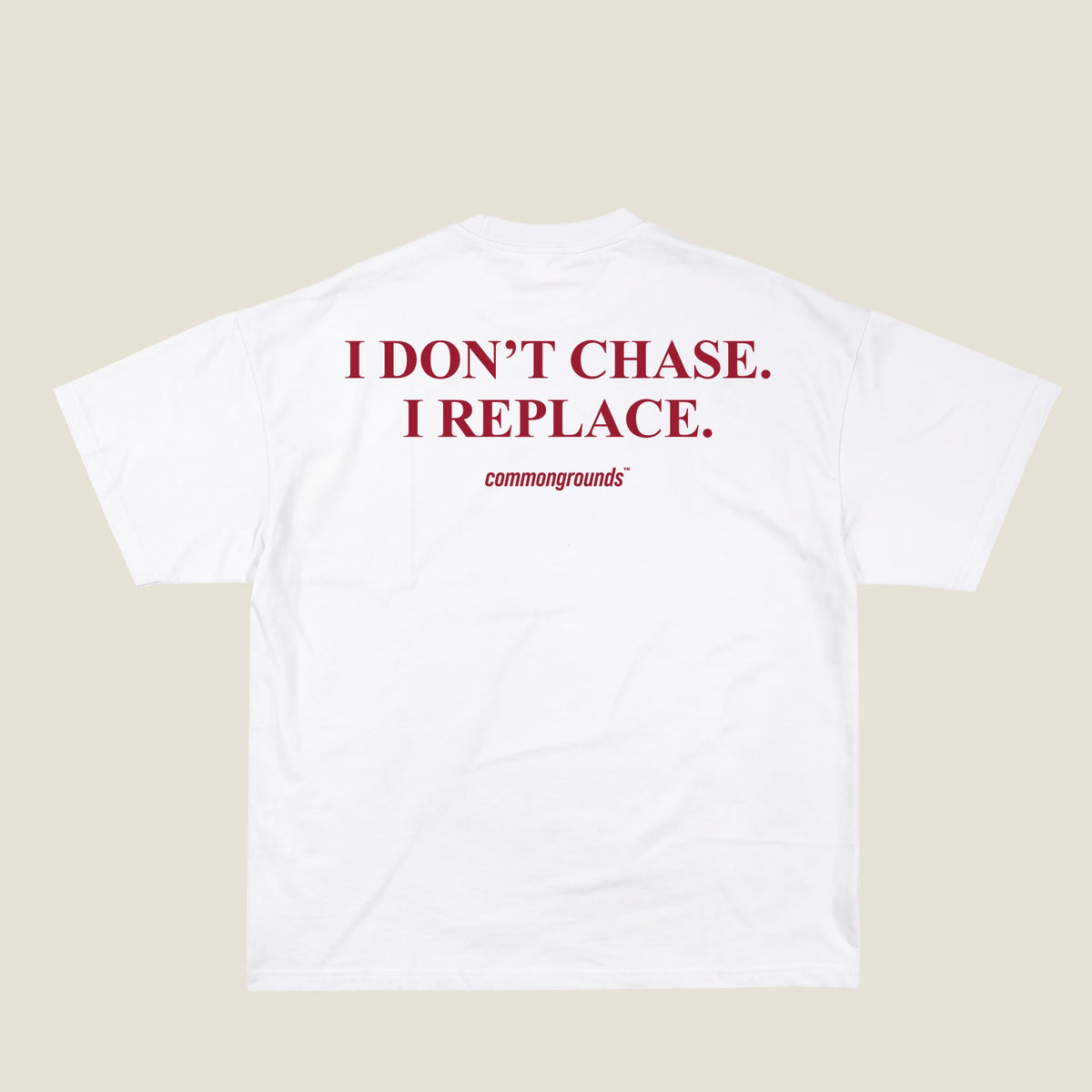 I DON'T CHASE. I REPLACE Tee in white, back print