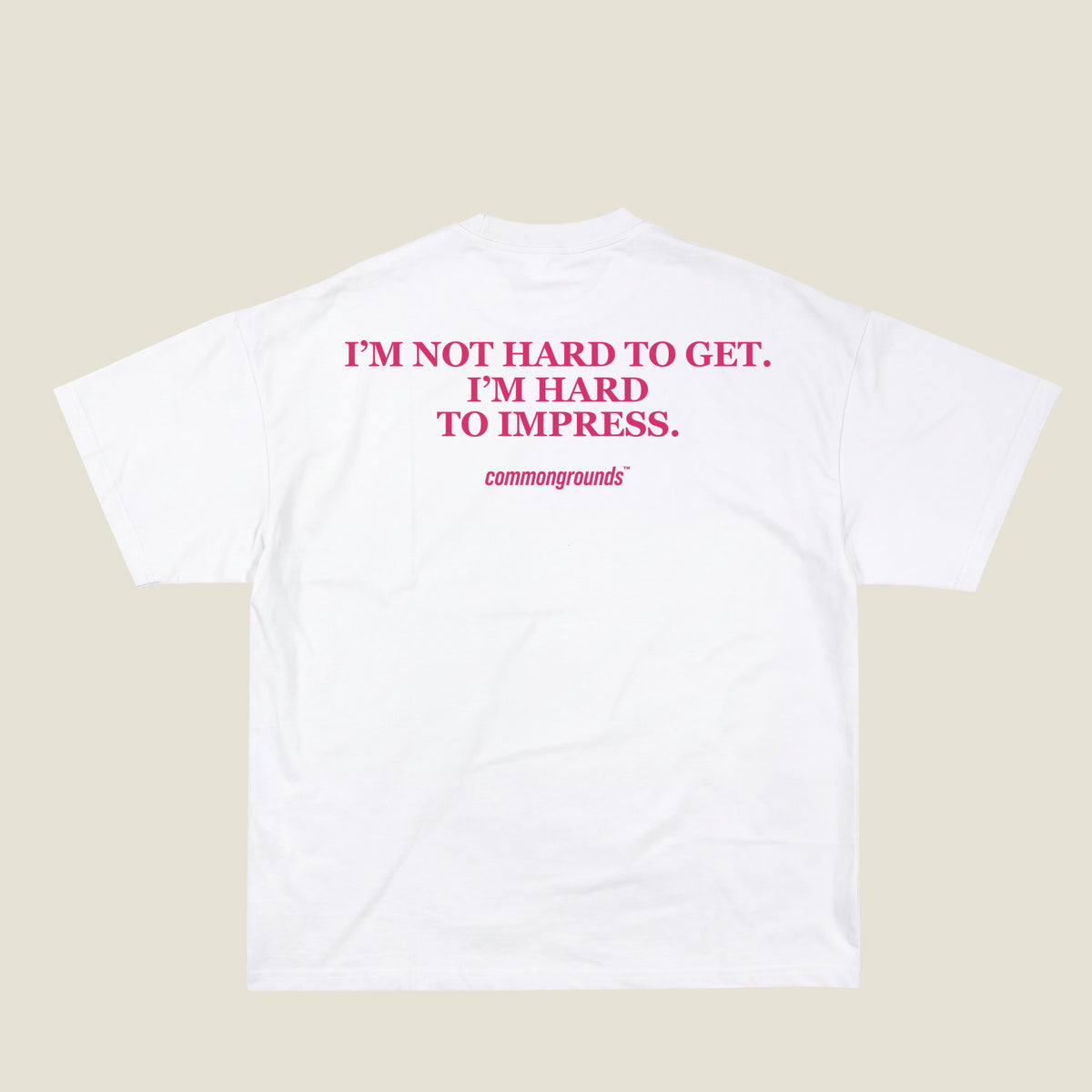 I'M NOT HARD TO GET. I'M HARD TO IMPRESS Tee in white, back print