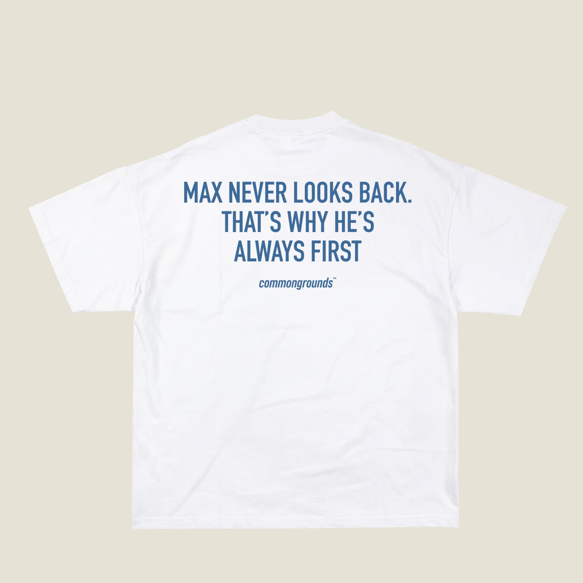 MAX NEVER LOOKS BACK. THAT'S WHY HE'S ALWAYS FIRST Tee in white, back print