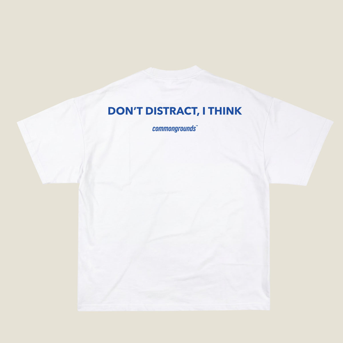 DON'T DISTRACT, I THINK Tee in white, back print