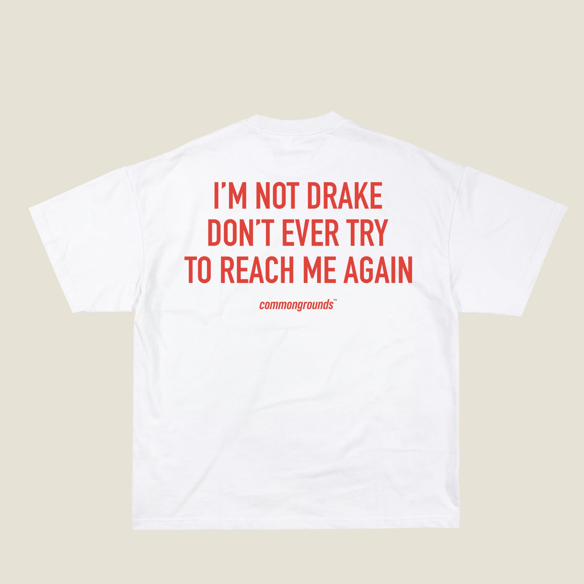 I'M NOT DRAKE DON'T EVER TRY TO REACH ME AGAIN Tee in white, back print