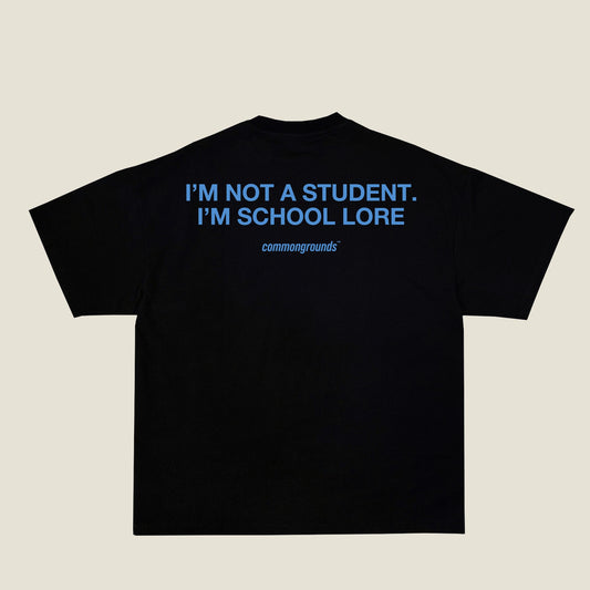 I'M NOT A STUDENT. I'M SCHOOL LORE Tee in black, back print