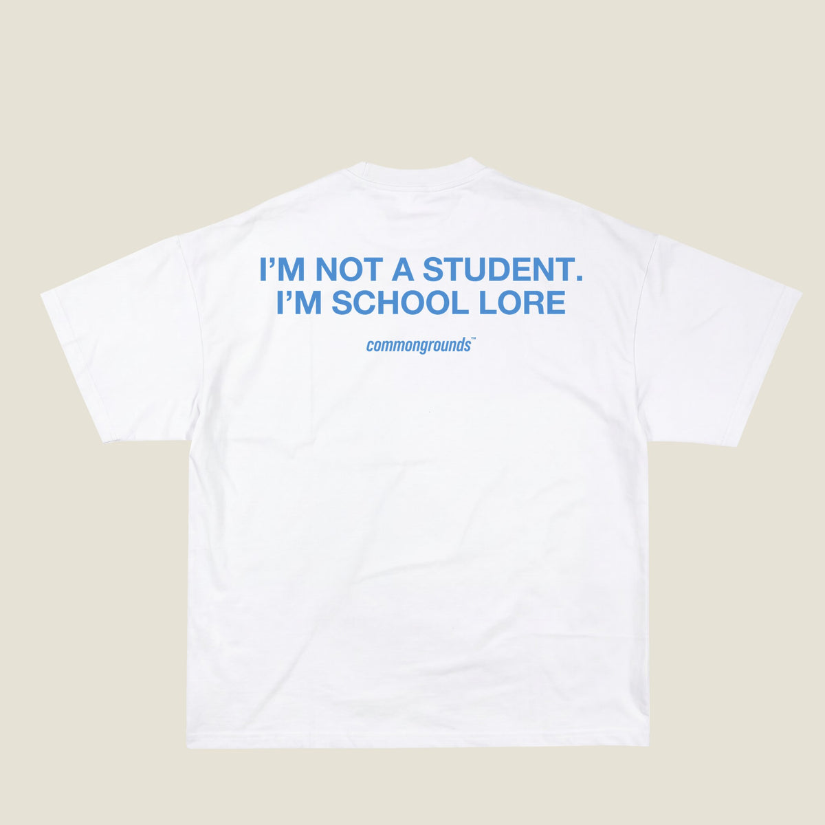 I'M NOT A STUDENT. I'M SCHOOL LORE Tee in white, back print