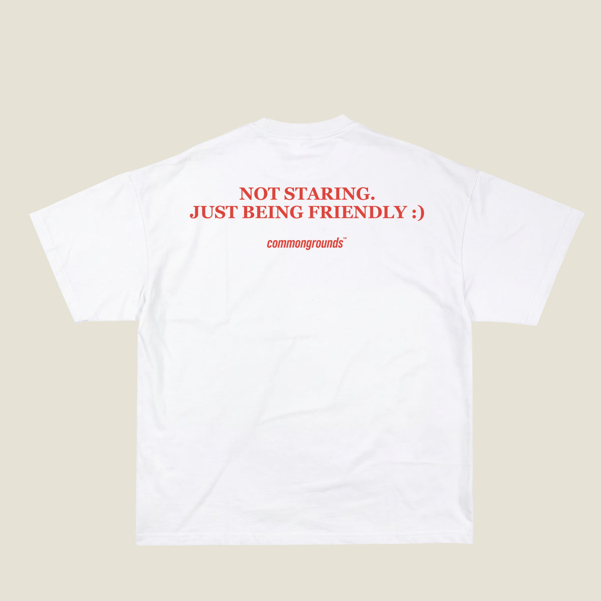 NOT STARING. JUST BEING FRIENDLY :) Tee in white, back print