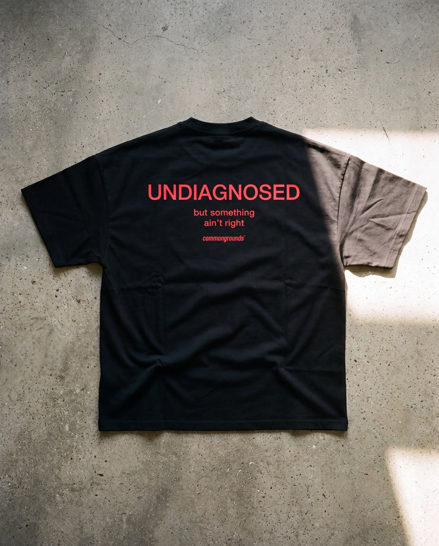 Common Ground tee flat-lay