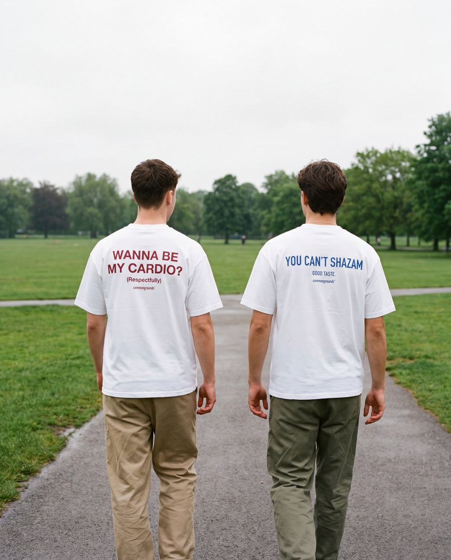 Two friends walking in Common Ground tees